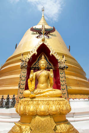 Wat Hong Thong has a Buddhist temple and a golden pagoda in the middle of the sea and is a religious tourist destination in Chachoengsao Province in Thailand.の写真素材