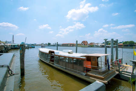 Beautiful landscape, the Chao Phraya River and the city on both sides of the river under the clear sky in Thailand.の写真素材
