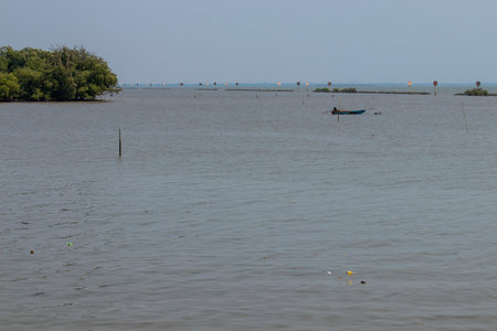 A view of the coastal sea with a fishing boat in the sea