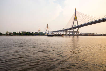 Bhumibol Bridge that crosses the Chao Phraya River and is one of the most beautiful bridges in Bangkok in Thailand.の写真素材