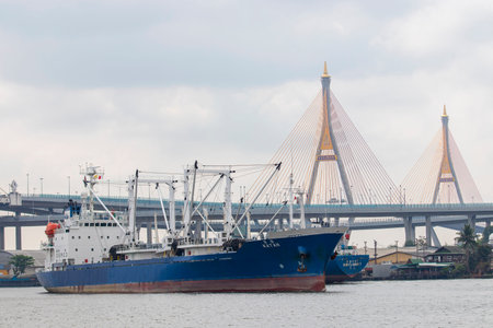 Cargo ships on the Chao Phraya River Along with the beautiful scenery of the Chao Phraya River in...