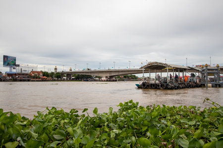 The landscape of the Chao Phraya River and the city on both sides of the river in Thailandの写真素材