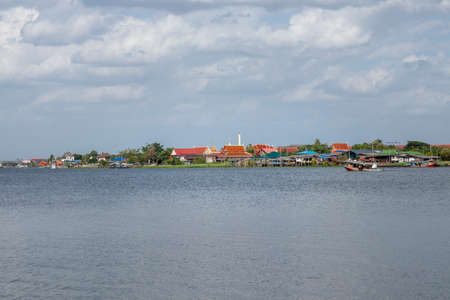 The landscape of the Chao Phraya River and the city on both sides of the river in Thailandの写真素材
