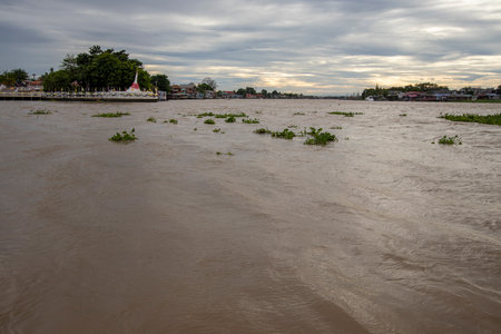 The landscape of the Chao Phraya River and the city on both sides of the river in Thailandの写真素材