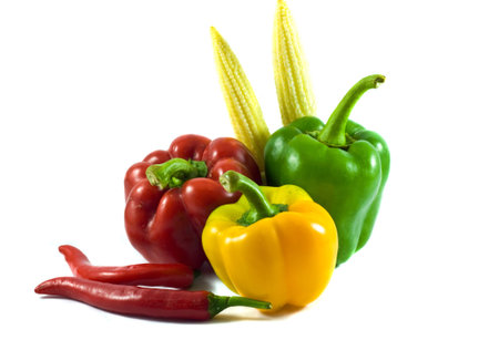 fresh pepper vegetables isolated on white background の写真素材