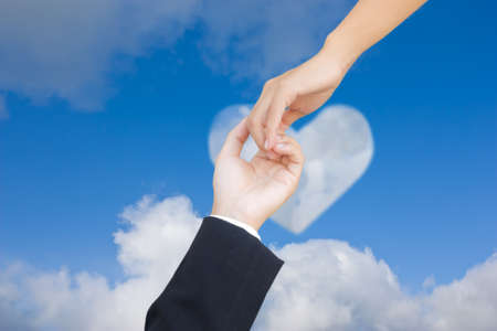 hand holding handの写真素材