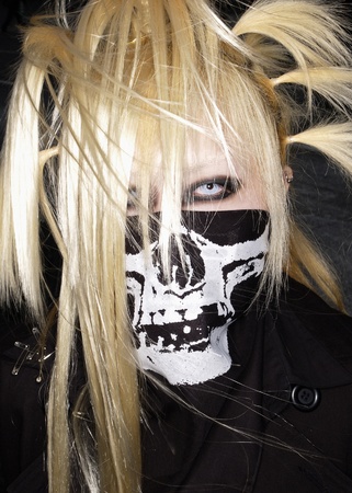 TOKYO - CIRCA MAY 2008: Unidentified Japanese girl in Cosplay outfit poses in Harajuku fashion district in Tokyo circa May 2008. Cosplay is a trend for dressing like Cartoon, Movie or Pop charactersのeditorial素材