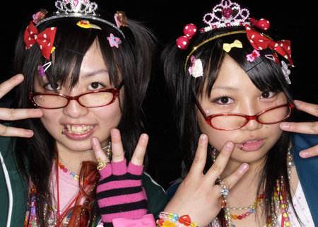 Japanese girl in Cosplay outfit poses for photo in Harajuku fashion district in Tokyoのeditorial素材