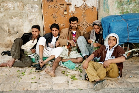 young men chewing khat in sanaa yemenのeditorial素材