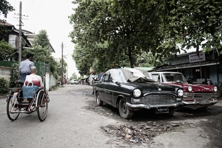 vintage cars on yangon myanmar streetのeditorial素材