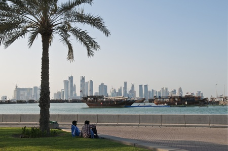 view of doha qatar with boats and skylineのeditorial素材