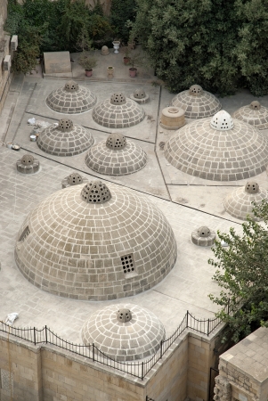 traditional rooftop air cooling domes in baku azerbaijanの写真素材