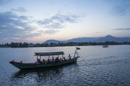 boat at sunset in kampot riverside cambodiaのeditorial素材