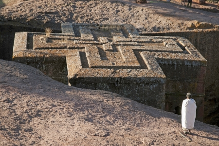 priest at ancient rock hewn churches of lalibela ethiopiaのeditorial素材