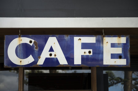 old rusty vintage cafe sign