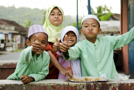 smiling muslim children in bali indonesia villageのeditorial素材