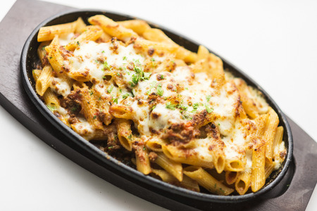 baked penne pasta with meat and cheeseの写真素材
