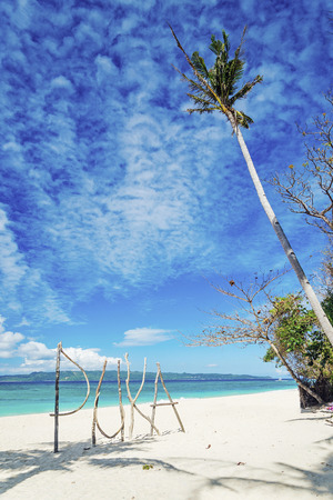 puka beach wooden sign in boracay tropical island philippinesの写真素材