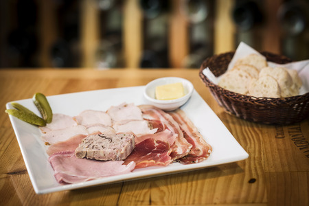 french mixed charcuterie smoked meats and pate platterの写真素材