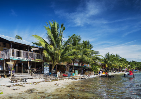 Foto de polluted dirty beach with garbage rubbish floating in sea on koh rong island cambodia - Imagen libre de derechos