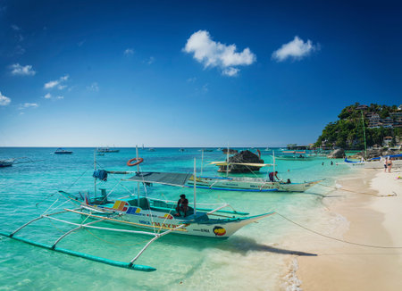 tourist water taxi tour boats in paradise diniwid beach boracay philippines