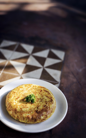 spanish tortilla egg omelette traditional tapas snack rustic style foodの写真素材