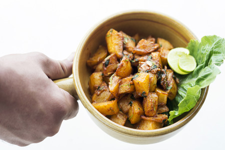 batata harra lebanese middle eastern spicy fried garlic herb potato snack foodの写真素材