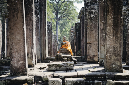 cambodian ancient buddha statue in famous landmark angkor wat temple siem reap cambodiaのeditorial素材
