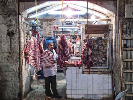 busy souk market shopping street in old town of aleppo syriaのeditorial素材