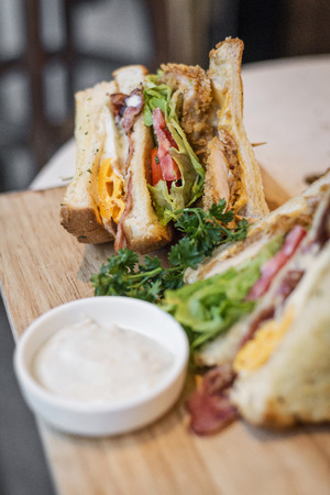 chicken burger bacon egg salad club sandwich set snackの写真素材