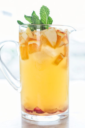 white wine and mixed fruit sangria cocktail drink jugの写真素材