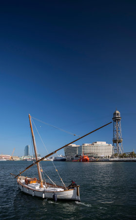 world trade center and barcelona port vell cable car jaume I tower in spainのeditorial素材