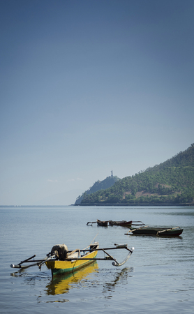 coast beach landscape view and boat near dili in east timor lesteのeditorial素材
