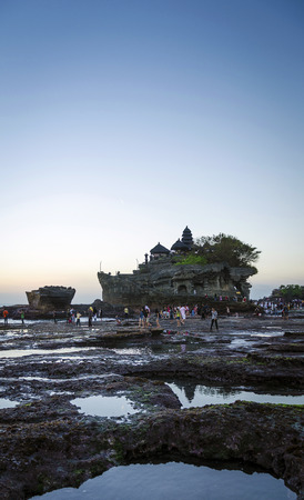 pura Goa Lawah hindu temple sunset backlight silhouette in bali indonesiaのeditorial素材