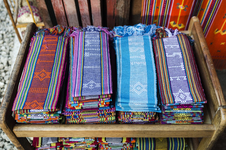 traditional woven tais fabric scarves in dili souvenir market east timor lesteのeditorial素材
