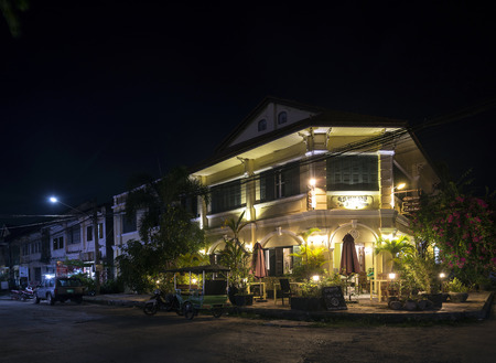 old french colonial houses in central kampot town street in cambodia at nightのeditorial素材