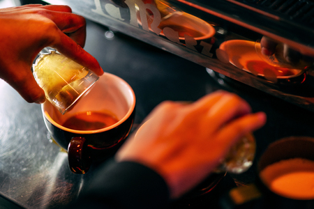 making espresso coffee close up detail with modern cafe machineのeditorial素材