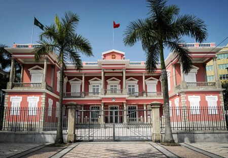 chinese government headquarters colonial heritage building landmark exterior in macau city at daytimeのeditorial素材
