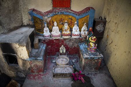 small chinese traditional local shrine in old taipa street of macau chinaのeditorial素材