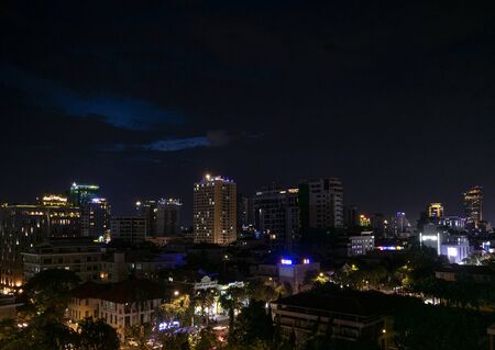 downtown central phnom penh city skyline night view in cambodia with modern skyscrapersのeditorial素材