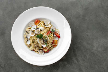 Spaghetti alle Vongole traditional italian seafood pasta with fresh clamsの写真素材