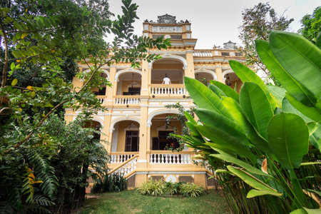 restored french colonial mansion building exterior in chhlong near kratie in cambodiaの写真素材
