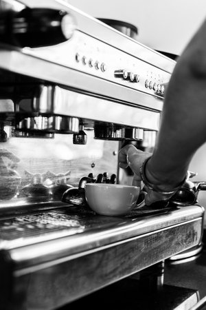 professional classic espresso coffee making machine close up in black and whiteの写真素材