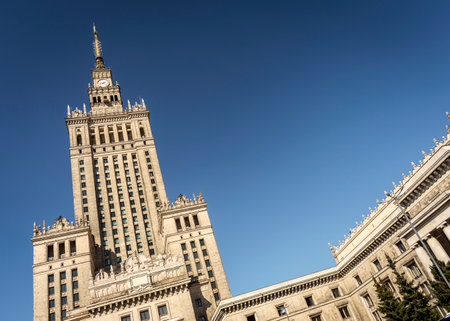 Palace of Culture and Science landmark building exterior in warsaw poland on sunny dayの写真素材