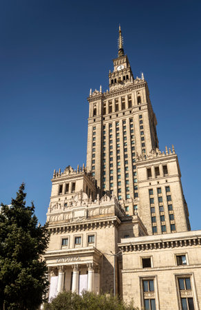 Palace of Culture and Science landmark building exterior in warsaw poland on sunny dayの写真素材