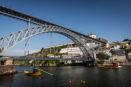 Dom Luis I bridge iconic landmark and riverside of old town of Porto Portugalのeditorial素材