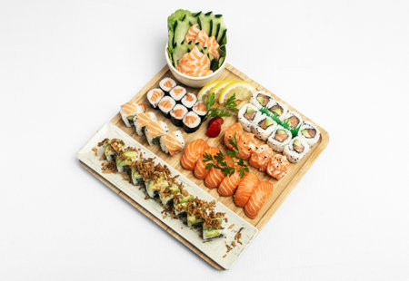 mixed sushi plate moriawase meal on plate in japanese restaurant on white backgroundの写真素材