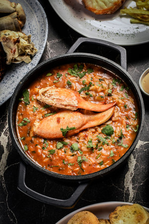 Portuguese traditional food Crab soup risotto meal on restaurant table in lisbon portugal