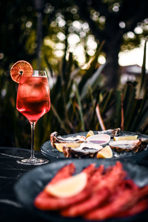 red wine sangria and spanish galician seafood snacks at sunset in santiago de compostela spain outdoorsの写真素材