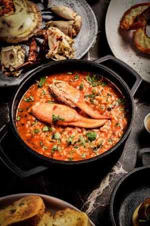 Portuguese traditional food Crab soup risotto meal on restaurant table in lisbon portugalの写真素材